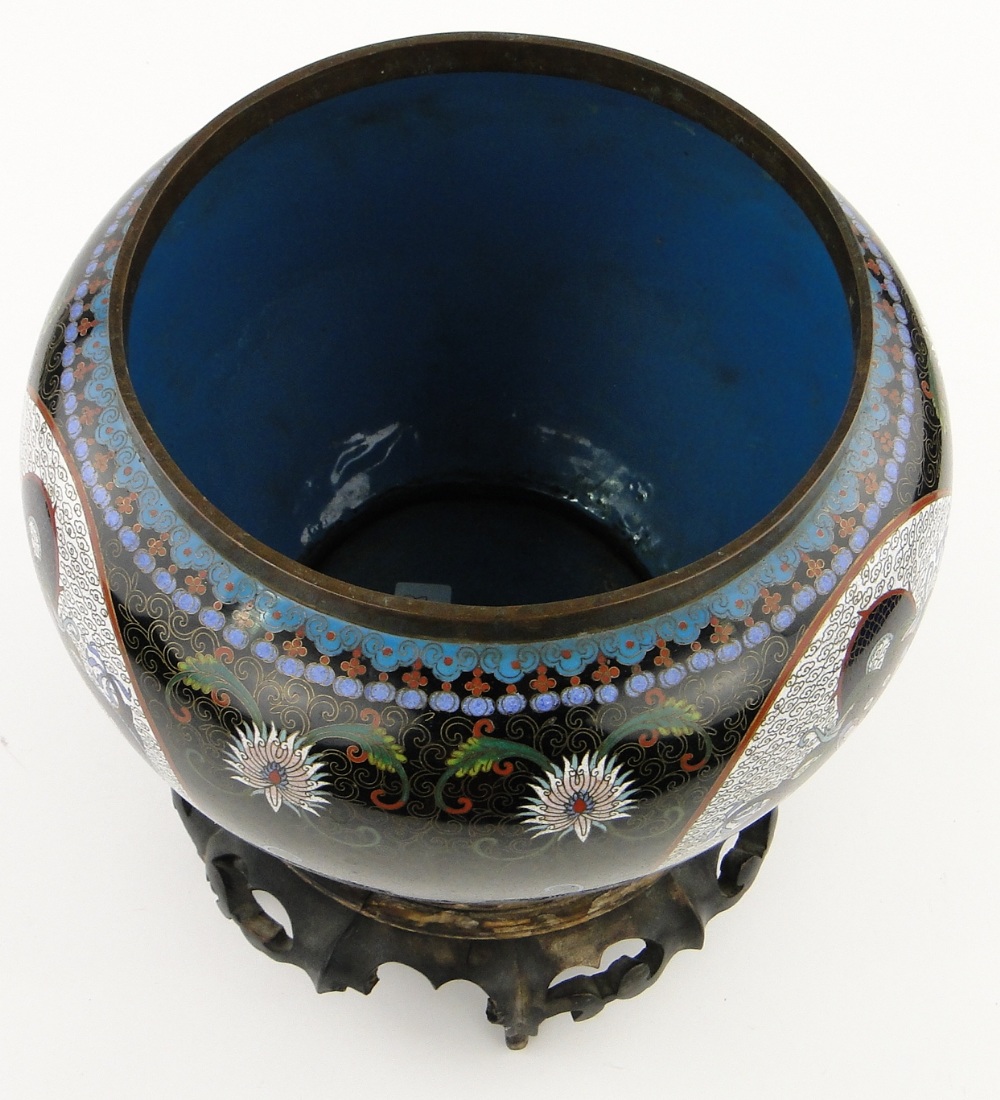 A black ground Cloisonne bowl
with dragon decorated panels, height 9.5", on carved wood stand. - Image 5 of 7