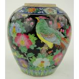 A Chinese porcelain jar
with bird and floral decoration, height 10.75".