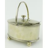 A silver plated spoon warmer.