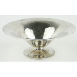 A Continental planished silver bowl,
marked 835, 16cm across.