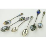 6 silver and enamel souvenir teaspoons.