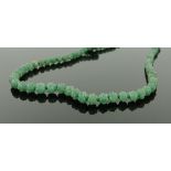 Chinese carved green stone bead necklace.