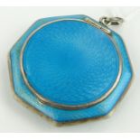 A Continental silver and blue enamel miniature compact,
marked 925, 4cm across.