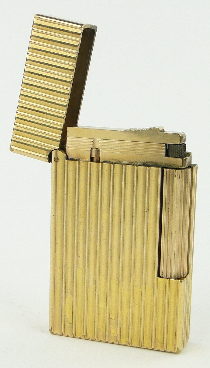 A DuPont gilt metal pocket lighter.