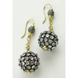 Pair of moonstone set ball shaped pendant earrings,
unmarked gold settings.