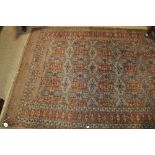 A blue ground Persian design rug.
