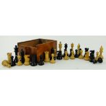 A Staunton turned wood chess set,
King height 3.5", boxed.
