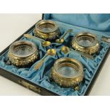 Set of 4 Continental silver gilt salts,
marked 800 with original cut-glass liners, cased.