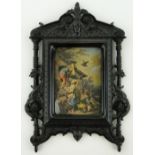 A composition frame
with mask and mythical beast decoration, 10.75".