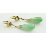 Pair of jade pendant earrings,
unmarked gold and pearl settings.