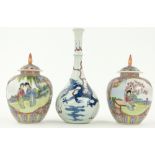 A porcelain bottle vase
with dragon decoration, 6.25" and a pair of jars and covers.