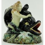 Antique Majolica study of a mermaid with a dolphin, 
height 8.5".