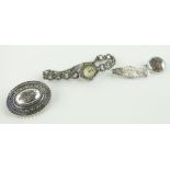3 Victorian silver brooches,
and a silver and marcasite watch.