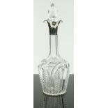 An Edwardian crystal and silver mounted decanter,
by John Grinsell, London 1901, height 34cm.