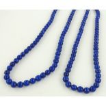 2 lapis bead necklaces.