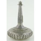 Unmarked Middle Eastern white metal vase
with engraved designs, a/f, height 19cm.