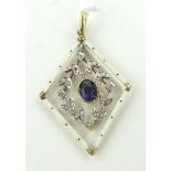 Unmarked gold lozenge shaped pendant
set with amethyst, diamonds and enamel,