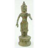 A patinated metal figure of an Eastern deity, 
height 19".