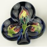 A Moorcroft trefoil dish
with tube-lined arum lily design, 5.25".