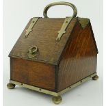 An oak double-sided humidor
with brass mounts, height 9.25".