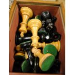 A turned wood Staunton chess set,
King height 3.5", with original box.