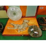 Carved stone horse
in fitted box, length 11.75", 2 stone discs and a crucifixion figure.