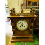 Walnut cased clock with enamelled dial and 2-train movement.