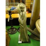 A composition Art Deco style figure of a woman,
by Austin productions USA, height 16.5".