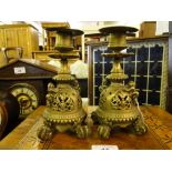 A pair of Oriental brass candlesticks, 
height 7".