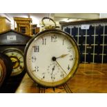 An 8-day French brass drum clock with alarm,
height 3.5".