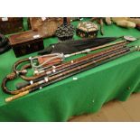 Shooting stick, walking canes, etc., (7).