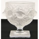 A Lalique moulded glass bowl on plinth
with design of birds and foliage, height 5.25".