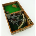 A black lacquered and brass sextant 
by W H Harling, London, early 19th century, in mahogany case,