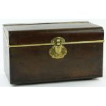 A small mahogany dome-top travelling trunk
with brass mounts, possibly for a car, length 17.75".