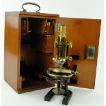 A brass microscope on stand by Carl Zeiss Jena, 13", 
with fitted carrying case.