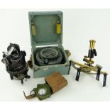 A boxed naval compass,
leather cased military pocket altometer,