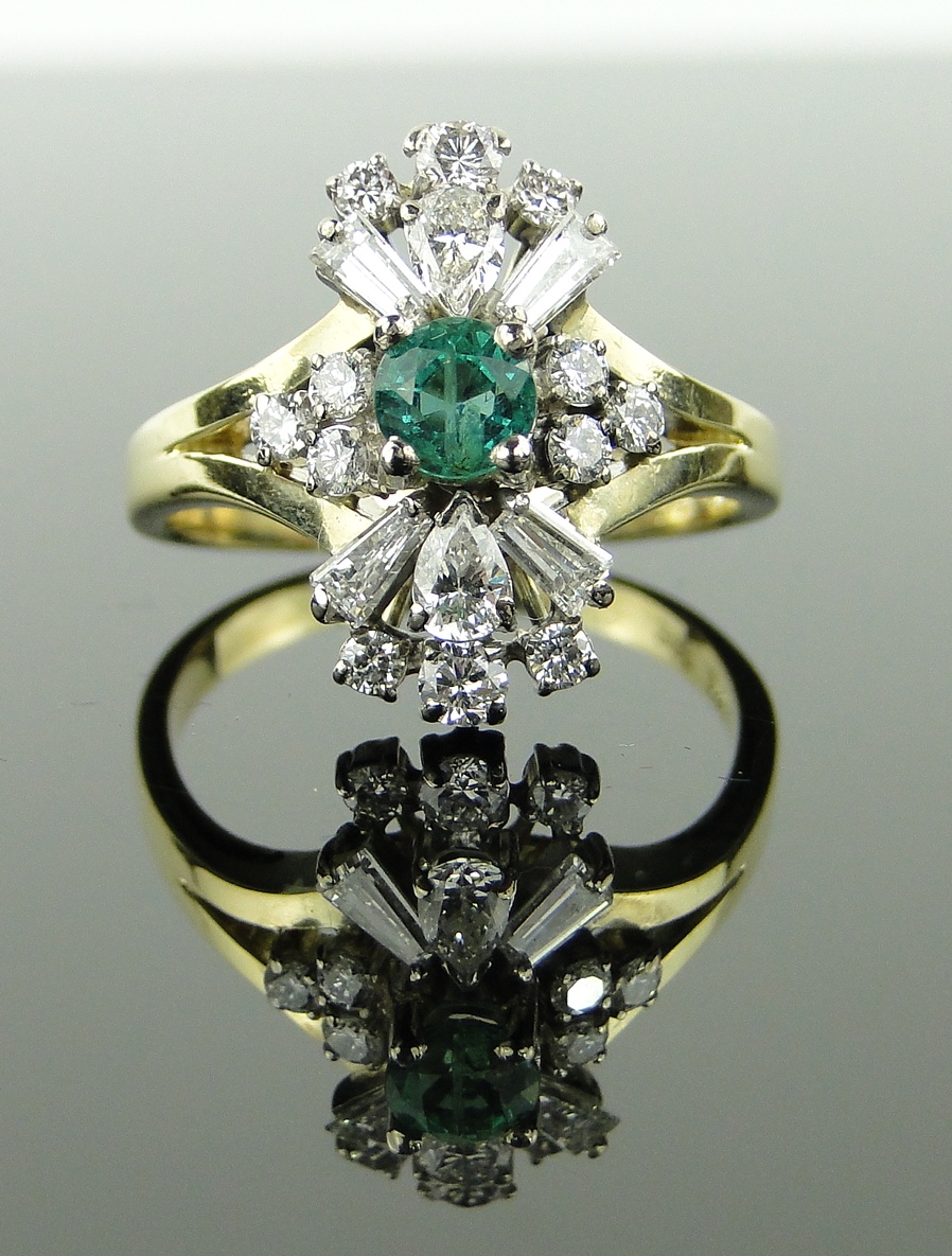 18ct gold emerald and diamond cocktail ring,
total diamond content approx.