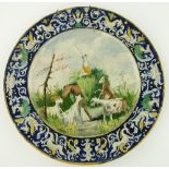 Antique Italian Maiolica plaque
with design of goats, a pony and figure, 23.5".