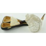 A Meerschaum pipe
with Turk's head, 7.5" and another Meerschaum pipe in case.