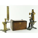 A brass microscope on stand by W Watson & Sons, High Holborn,
10.75", and another brass microscope.