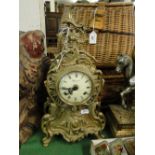 Cast brass imperial mantel clock with 2-train movement.