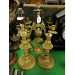 Brass candelabrum and 2 pairs of candlesticks.