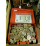 Box of pre-decimal English coins and £1 notes.