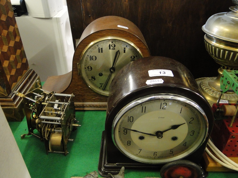 Two 2-train mantel clocks and two movements.