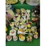 Doulton and other floral arrangements.