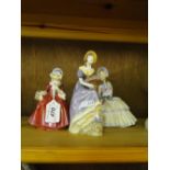 Royal Doulton "Day Dreams," "Lavinia " and a Coalport figure, (3).