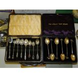 Cased set of 6 silver gilt spoons with fox finials, and some continental silver Collectors spoons,