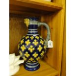 Minton Majolica jug with mask spout.