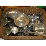 An Arts & Crafts design silver plated candelabra, silver plate on copper caddy, toast rack, cutlery,