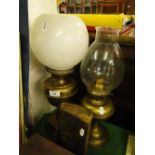 2 brass oil lamps and early John Kersey book.